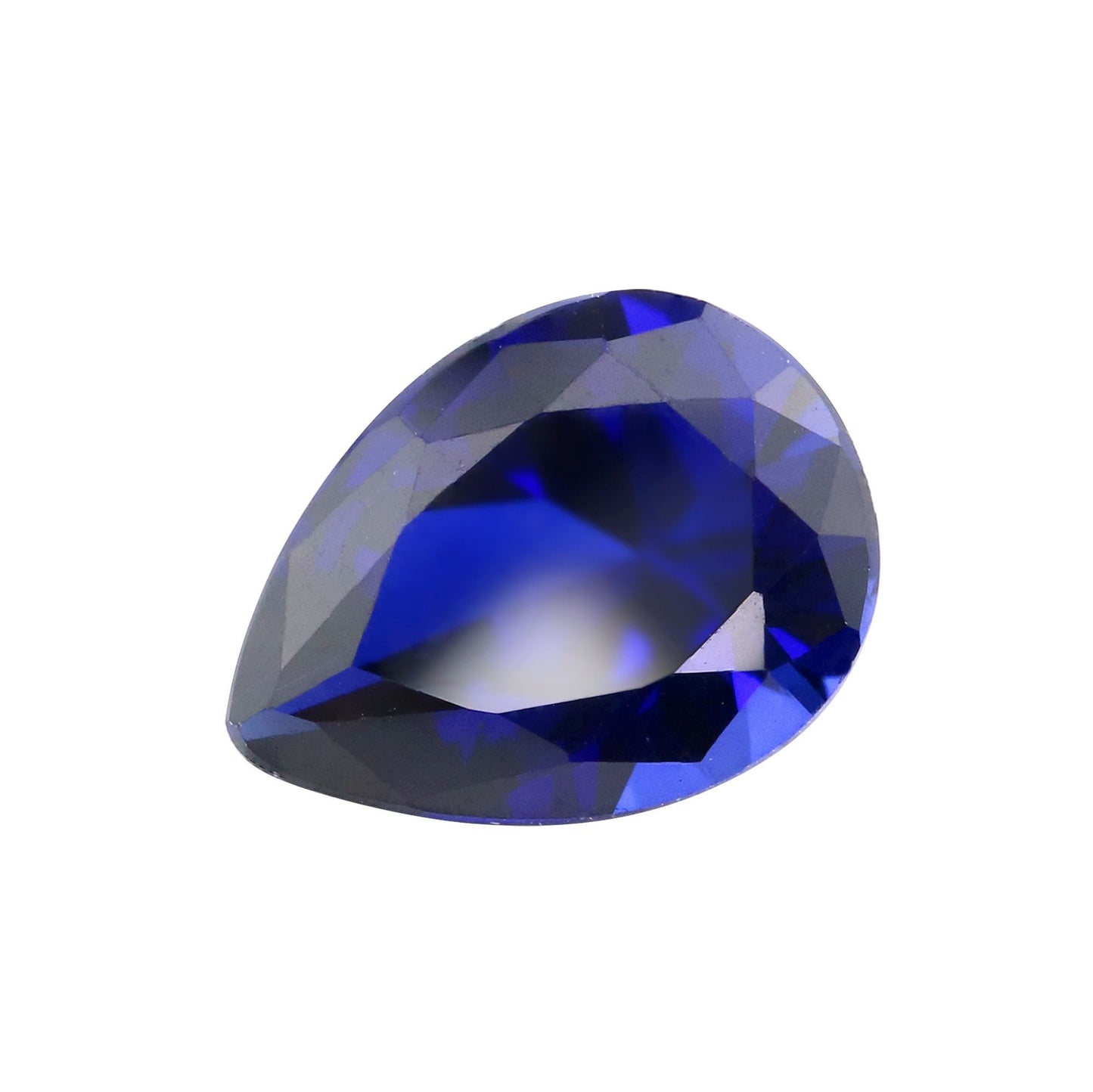 A tear drop cut dark blue lab created sapphire.