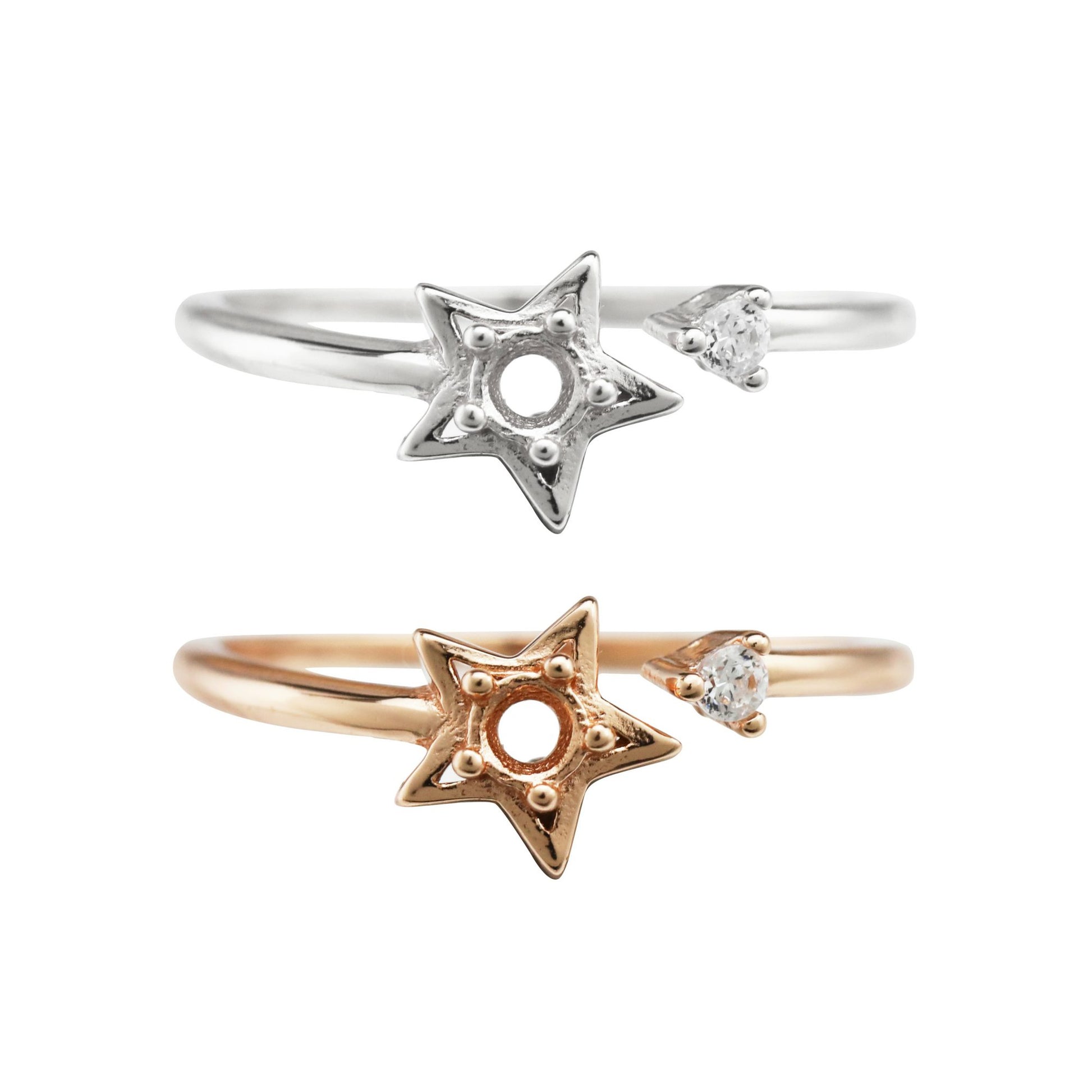 One silver and one rose gold one size fits all star and arrow semi mount for a round gem.
