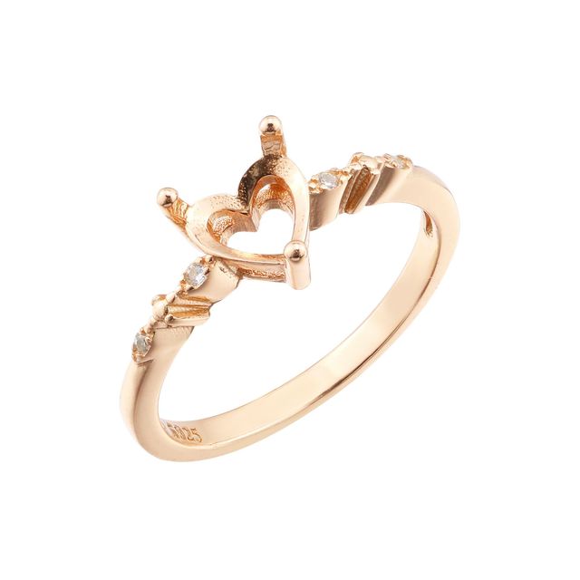 A rose gold semi mount to fit a heart cut gem with small round accent gems on the band.
