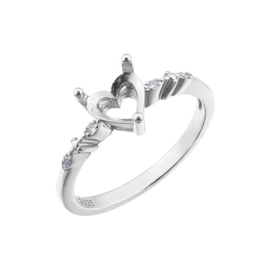 A silver semi mount to fit a heart cut gem with small round accent gems on the band.
