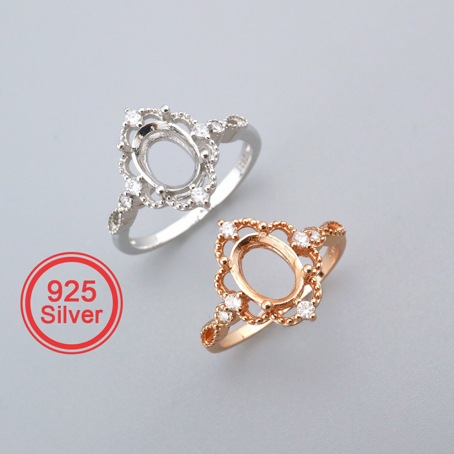 One silver and one rose gold lacey style oval vintage halo semi mounts.