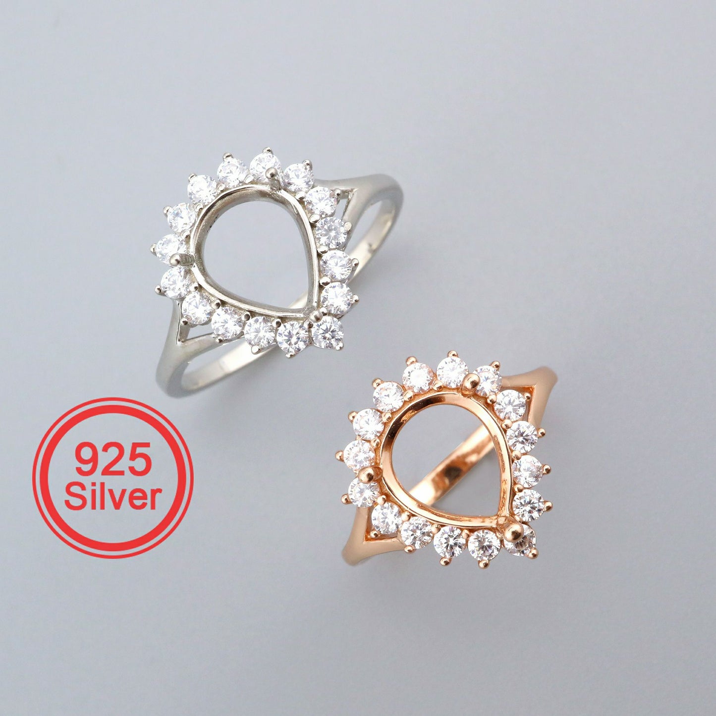 One silver and one rose gold pear halo semi mount setting.