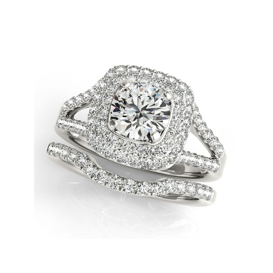 A silver ring set with a round moissanite surrounded by a squared double halo with a matching wedding ring.