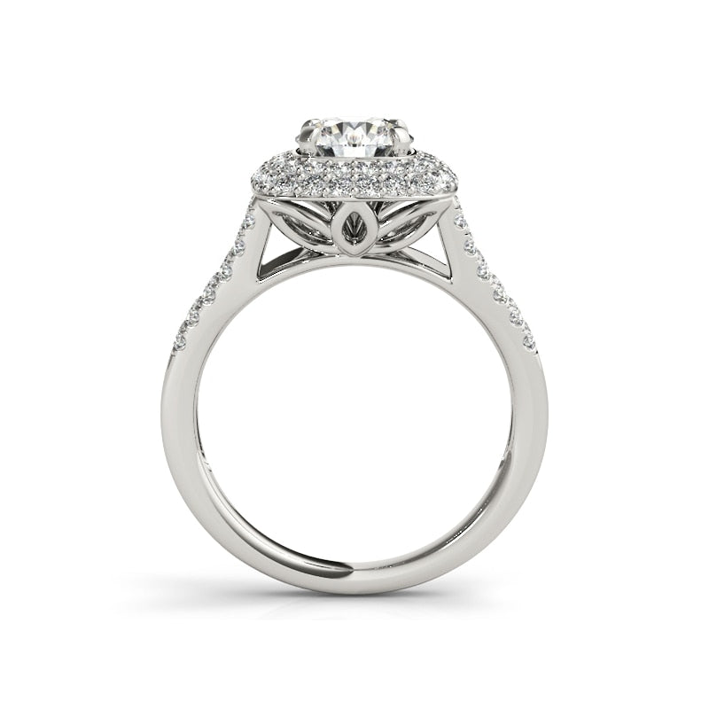 A silver ring set with a round moissanite surrounded by a squared double halo on a split pave shank..