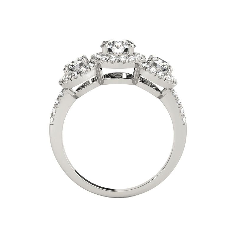 A silver 3 stone halo ring.