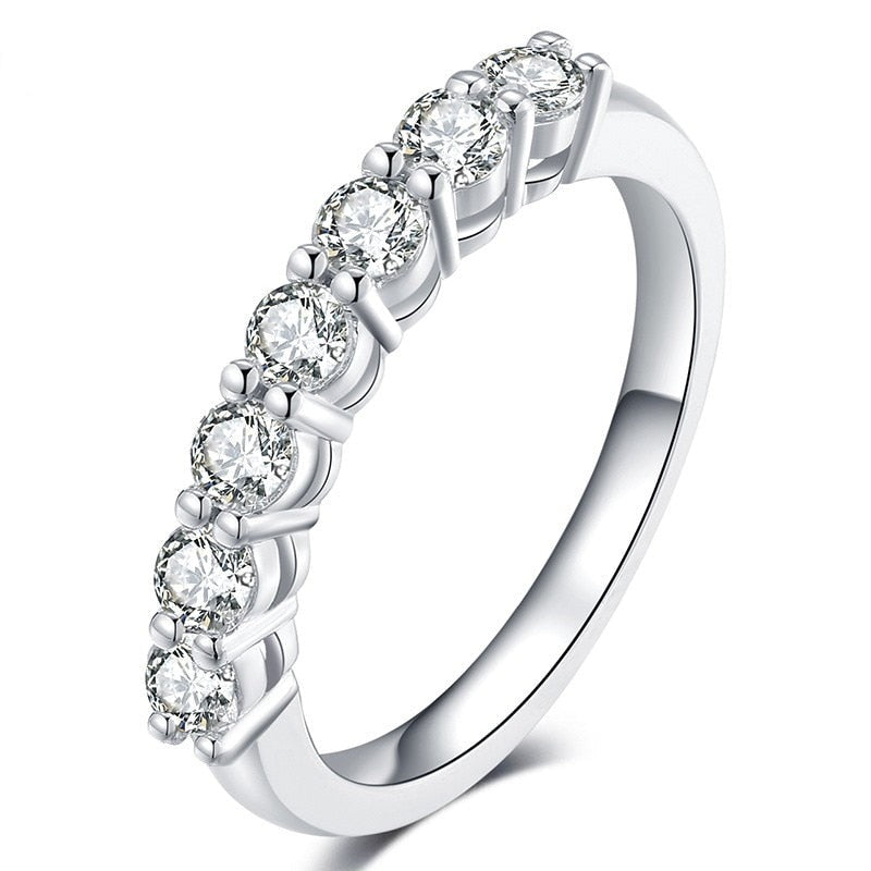 A silver 6 stone wedding ring.