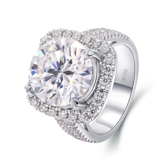 A silver halo ring set with a 8CT round moissanite in a wide half pave band.