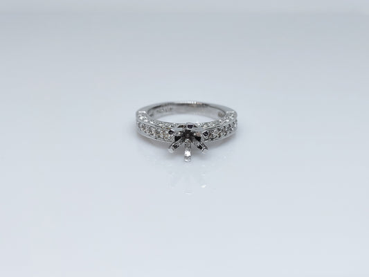 A silver pave banded semi mount with infinity filigree design on each side of the shank.