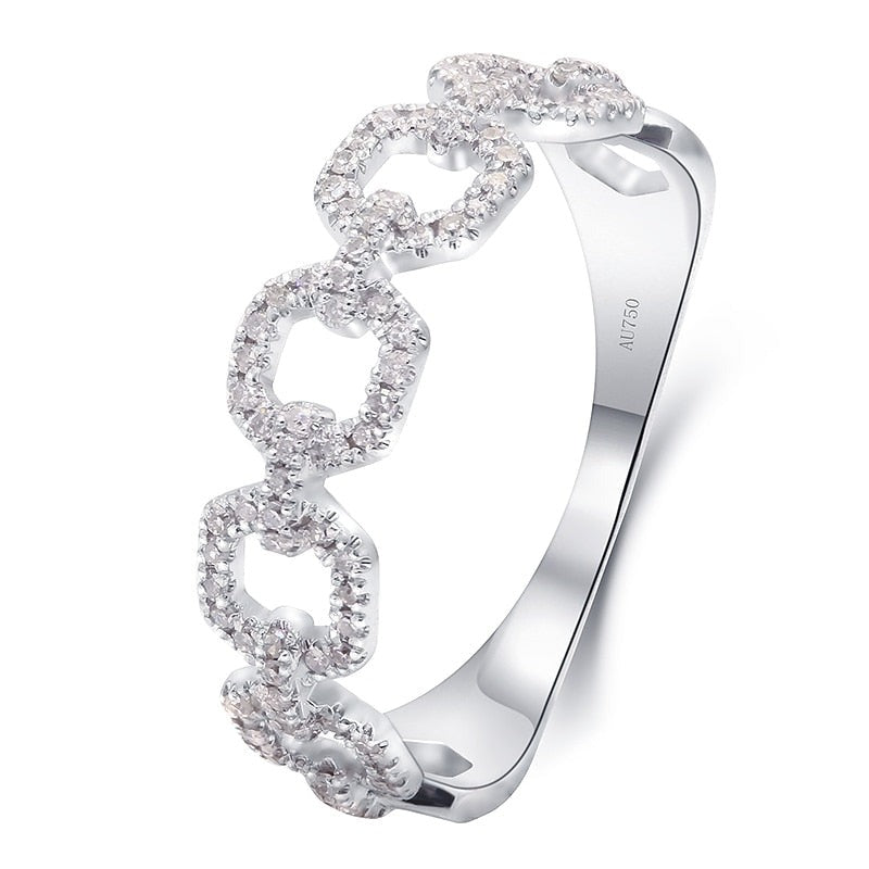 A silver gem encrusted chain link style ring.