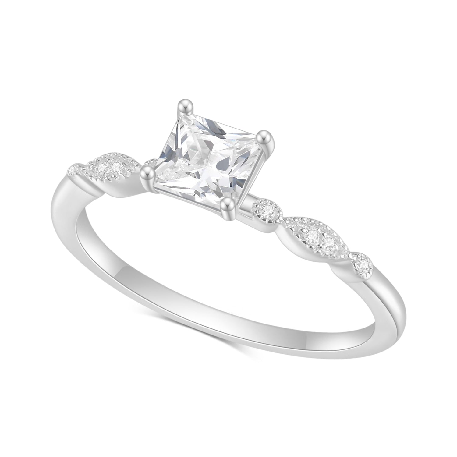 A silver art deco princess cut moissanite engagement ring.