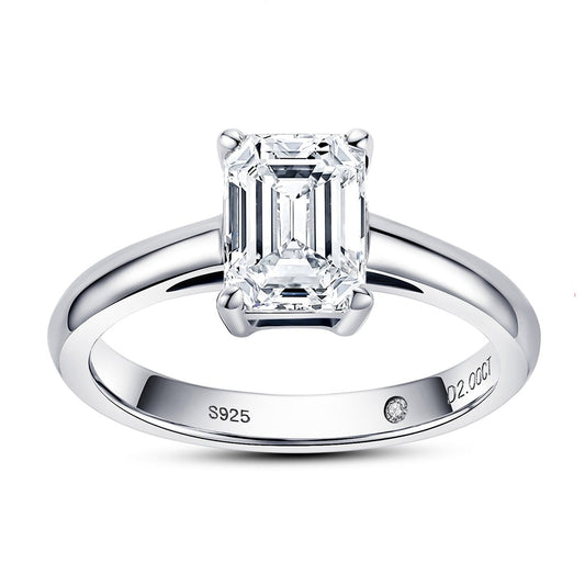 A 2CT emerald cut moissanite sterling silver ring.