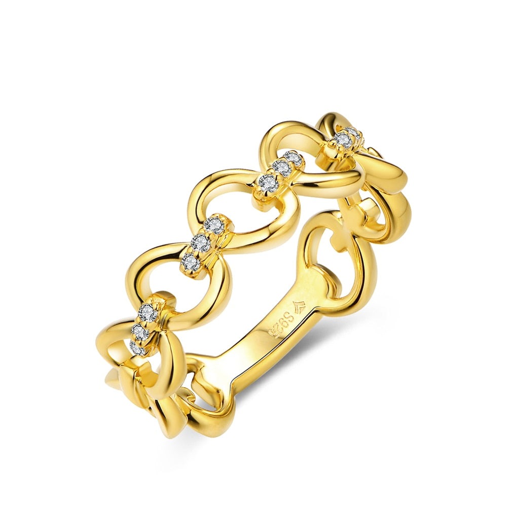 A gold chain link ring with 3 small moissanites connecting each link.