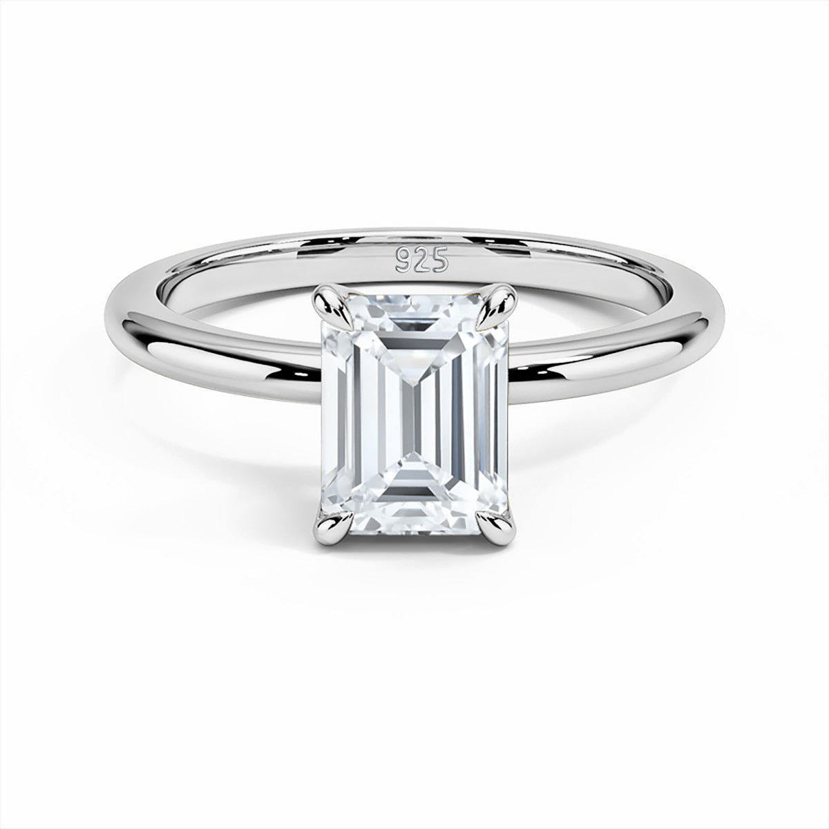 A silver band set with a 3CT emerald cut moissanite in petal style prongs.