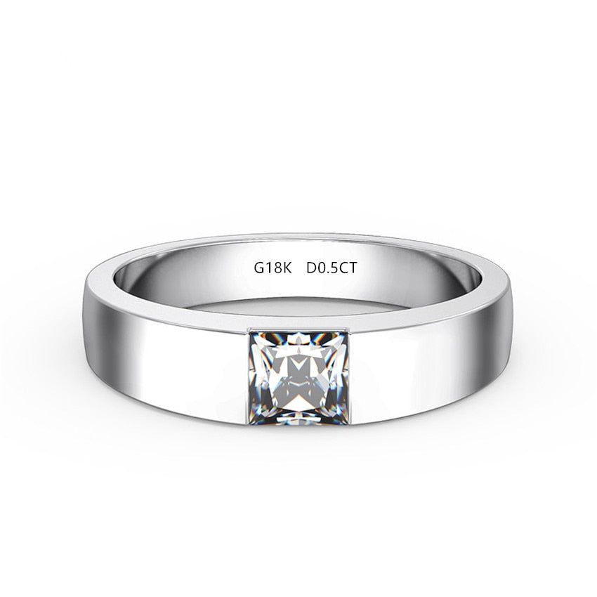 A silver solid band tension set with a princess cut moissanite.