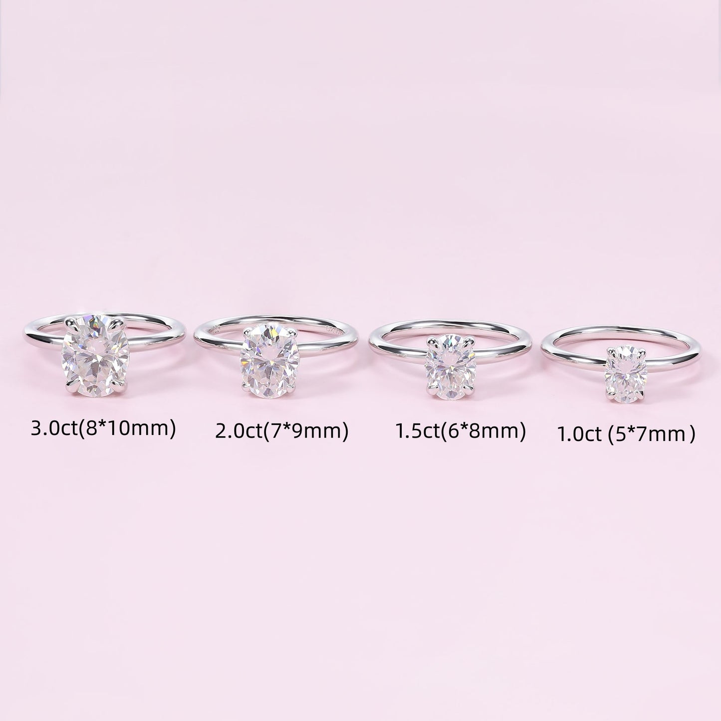 Four silver oval cut hidden halo engagement rings of varying stone sizes.