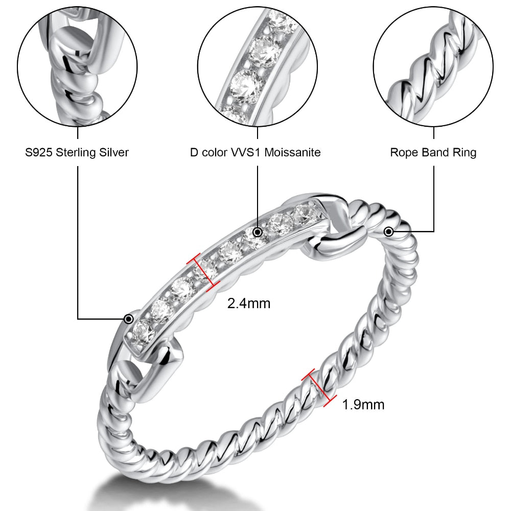 A silver chain and rope style ring set with 8 horizontally set moissanites.