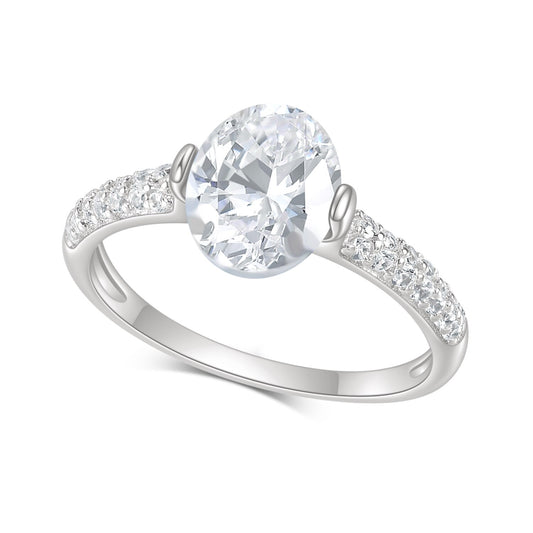 A silver tension set ring with a oval moissanite and double row pave band.