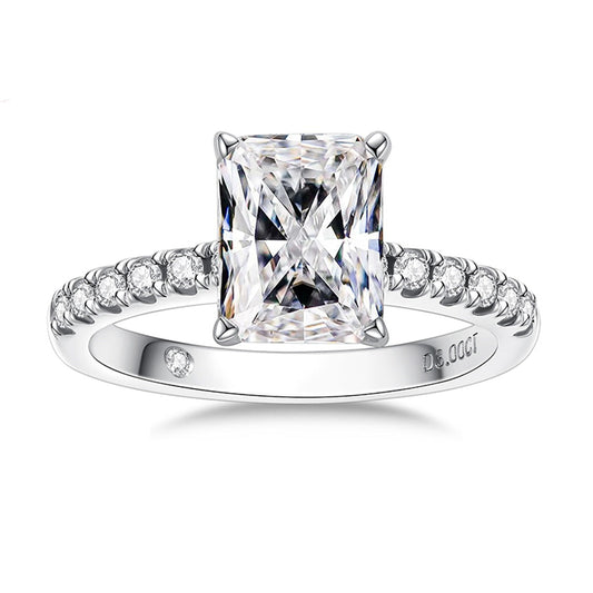 A Moissanite ring with a 3CT radiant cut gem set on a moissanite pave band.