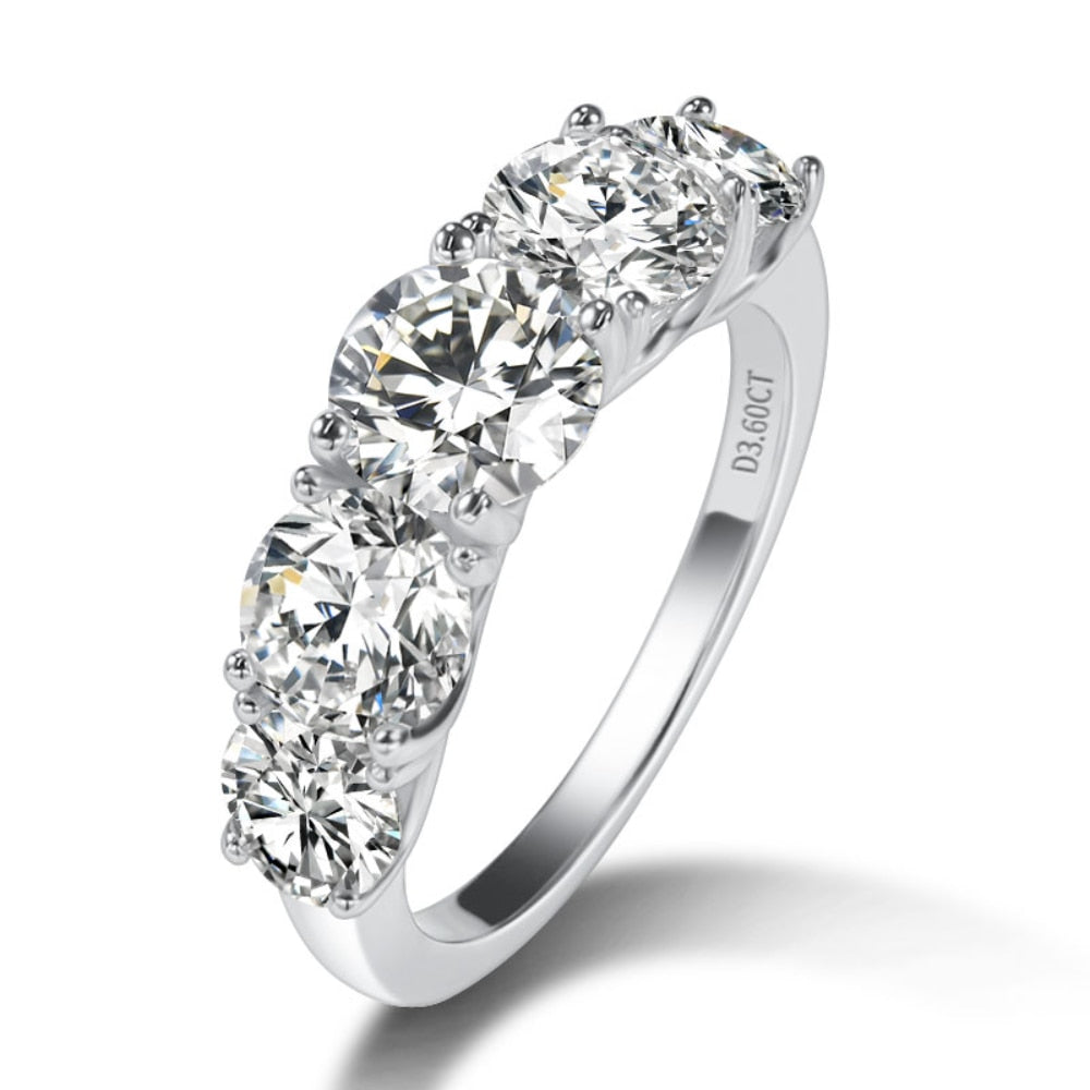 A silver 5 stone wedding ring.