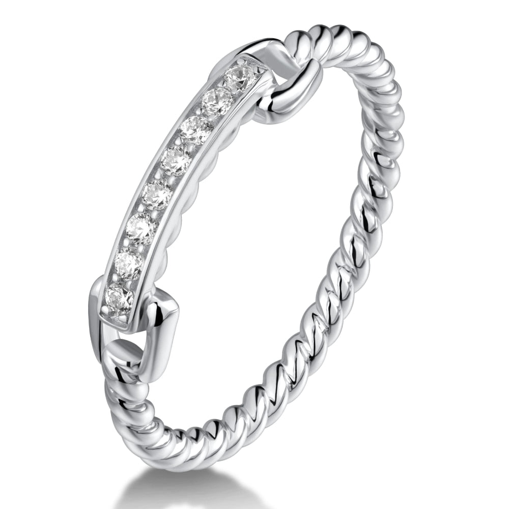 A silver chain and rope style ring set with 8 horizontally set moissanites.