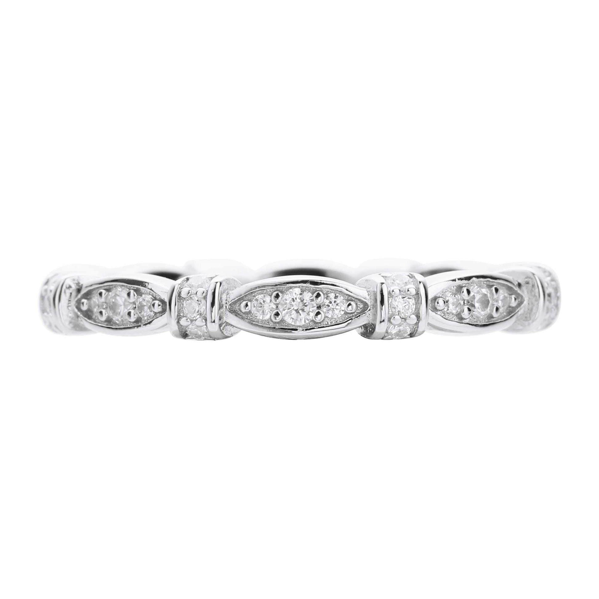 A silver ribbon scalloped style ring set with clear small gems.
