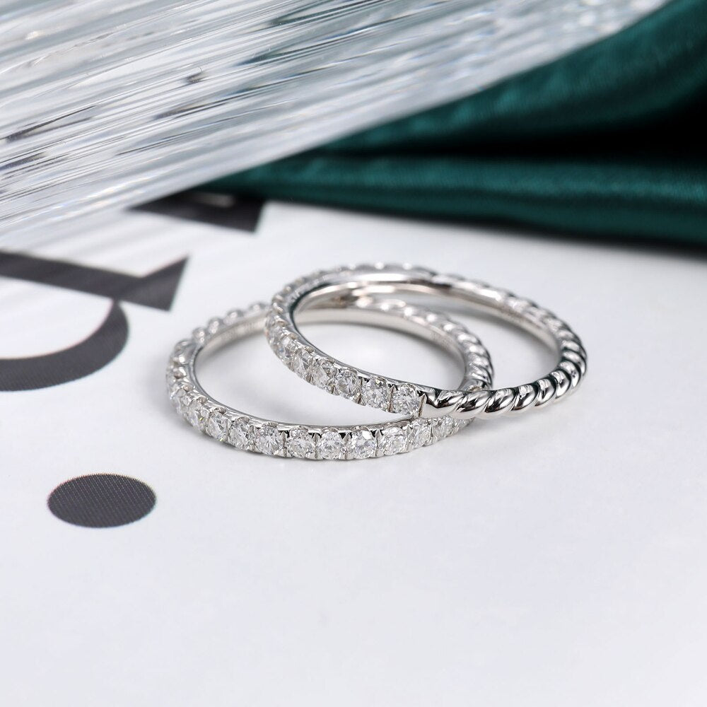 Two silver half eternity rings and half silver  twisted rope band rings.