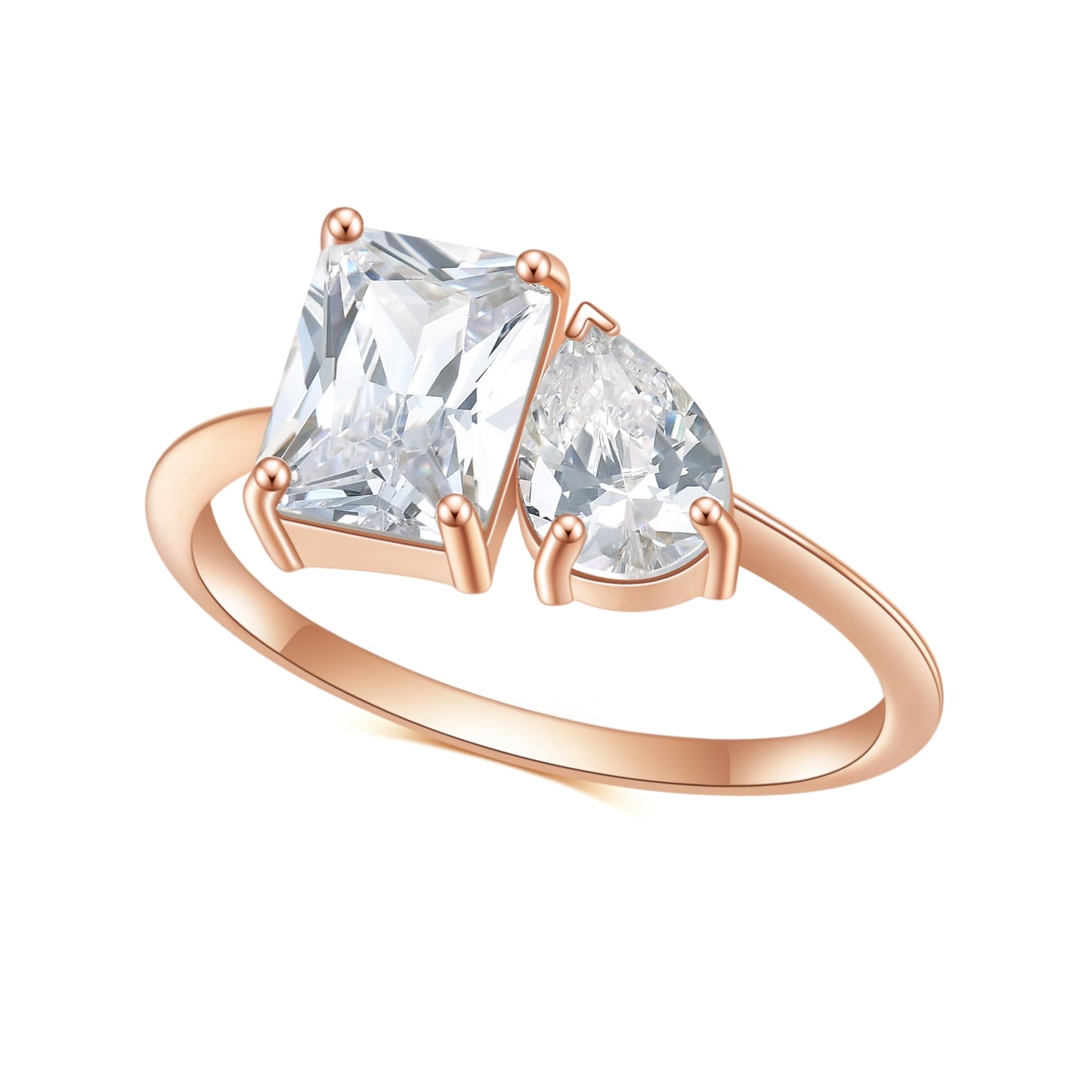 A rose gold Toi et Moi ring with a emerald cut moissanite and a tear drop moissanite.