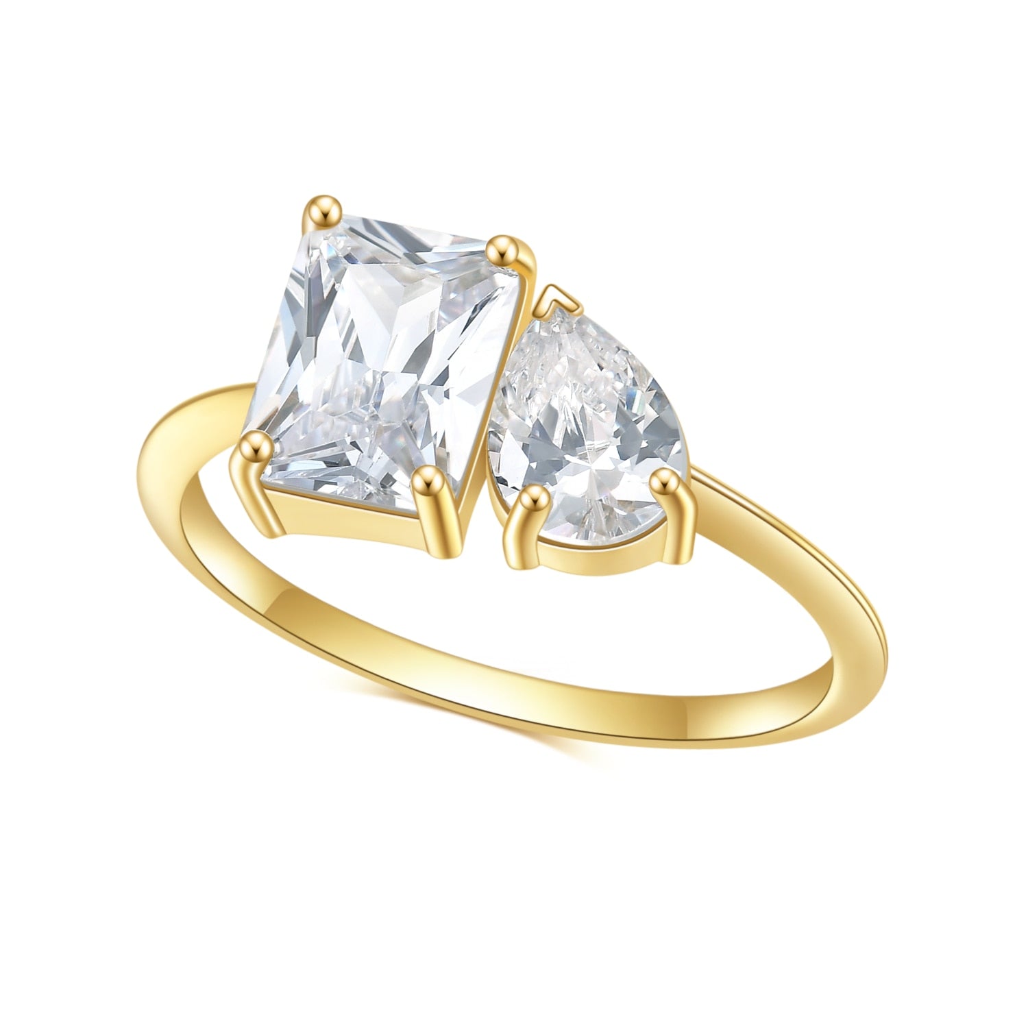 A gold Toi et Moi ring with a emerald cut moissanite and a tear drop moissanite.