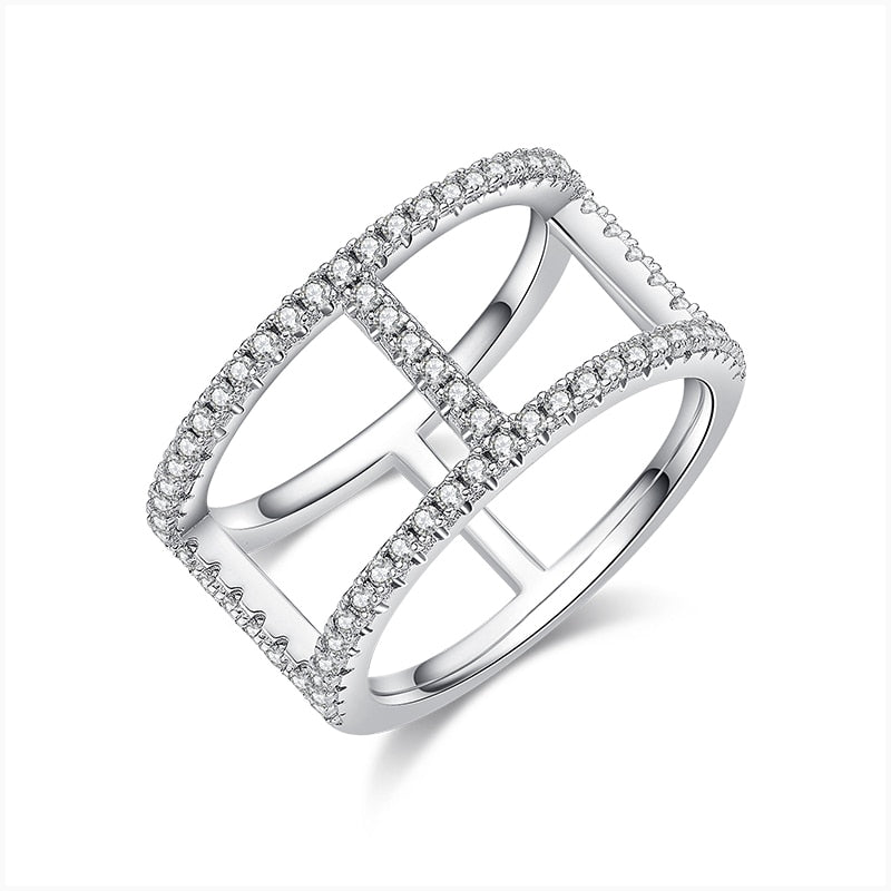 A silver double band moissanite ring.