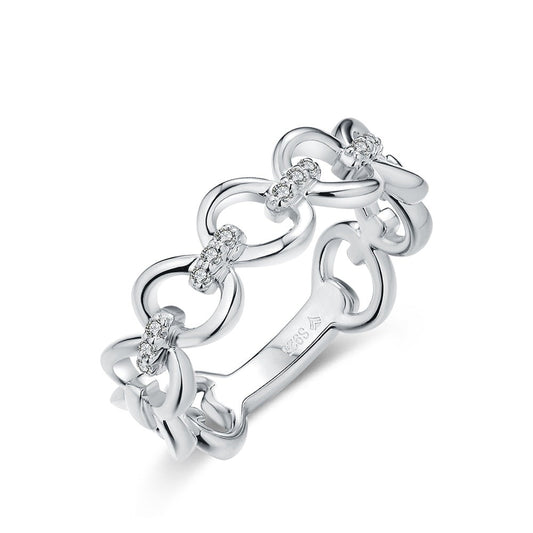 A silver chain link ring with 3 small moissanites connecting each link.