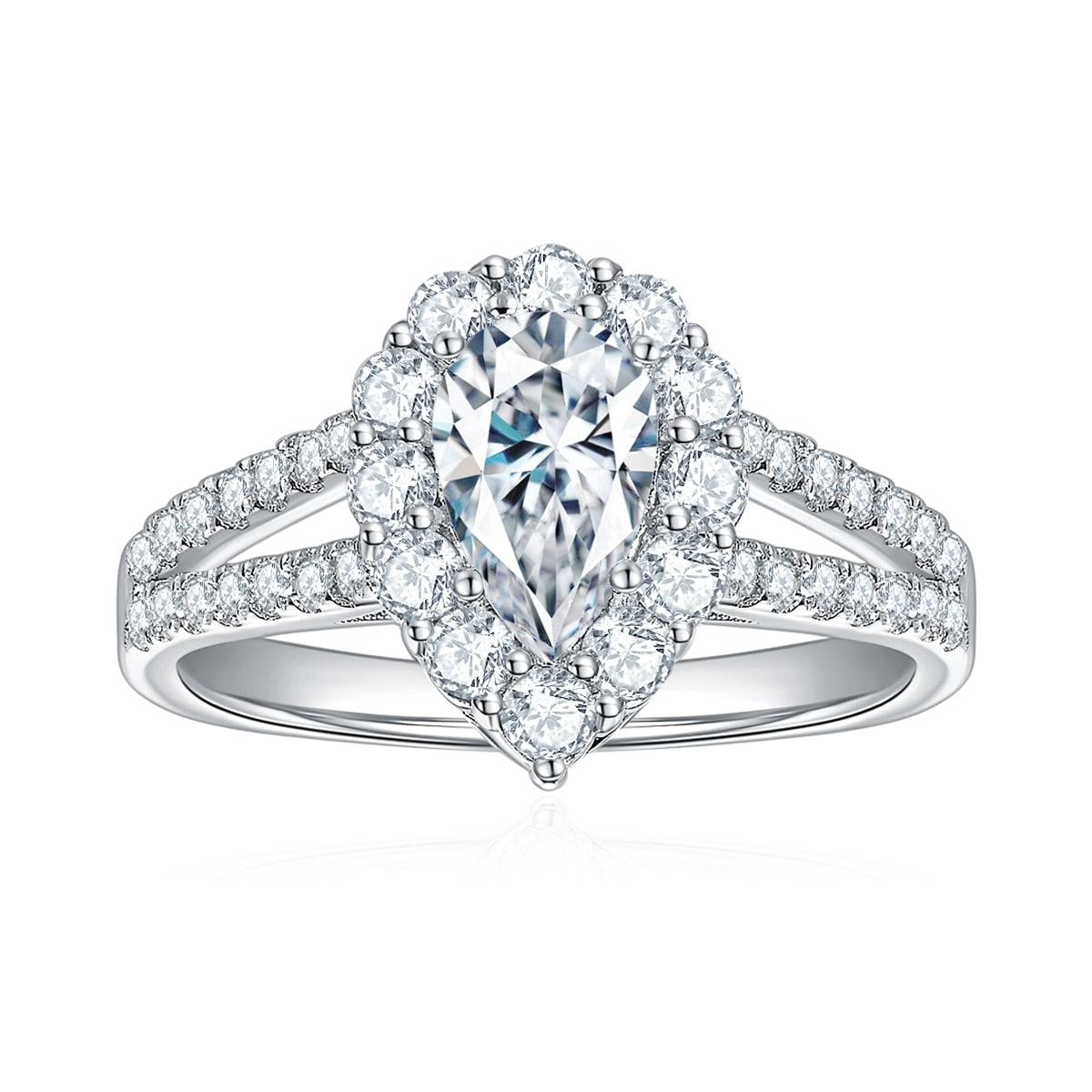 A silver tear drop halo split shank engagement ring.