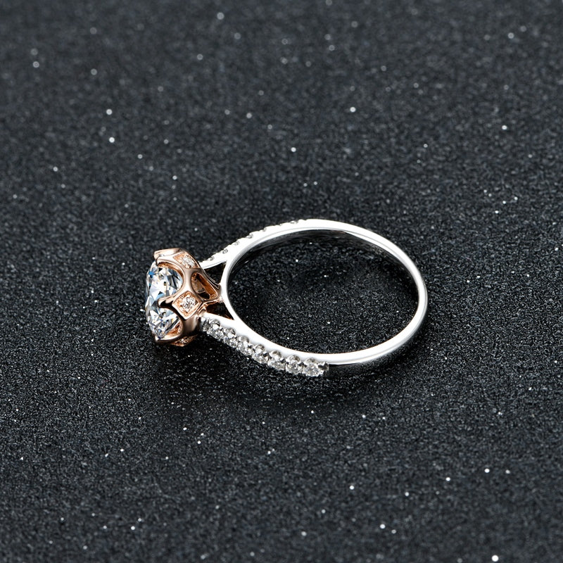 Solid sterling silver two tone rose gold and silver round cut moissanite with pave band engagement ring with matching pave wedding ring.